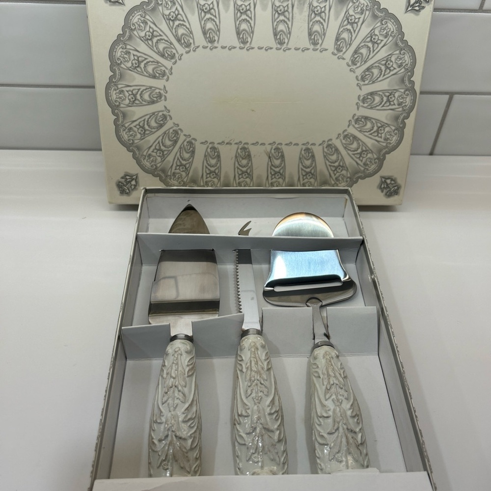 Elegant Silver and Cream Cheese Knife Set